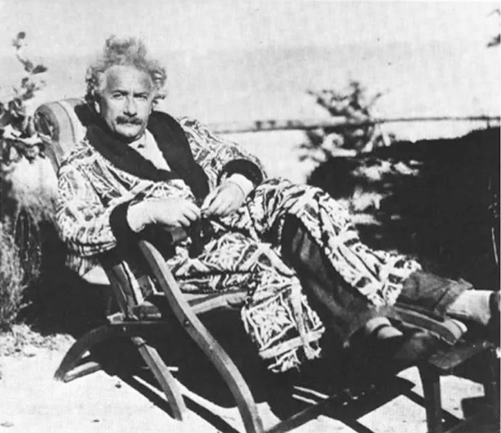 einstein lounging in a robe.